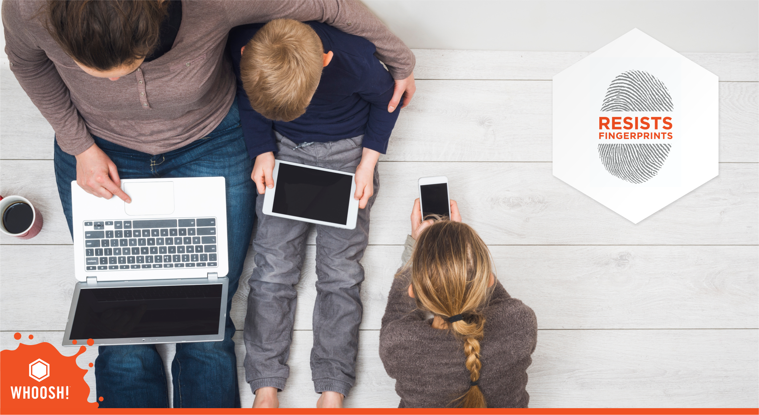 Family using laptop, tablet and smartphone on a white floor, highlighting WHOOSH! screen cleaner that resists fingerprints on everyday devices.